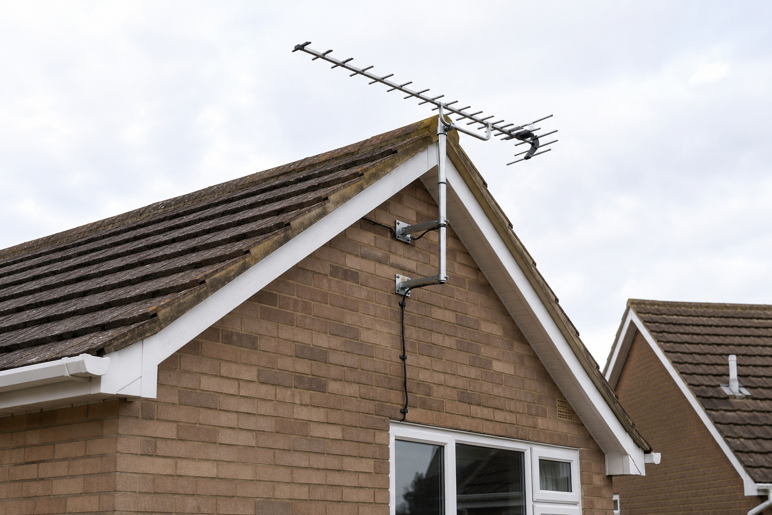Digital TV aerial fitted to a domestic roof in Warwickshire